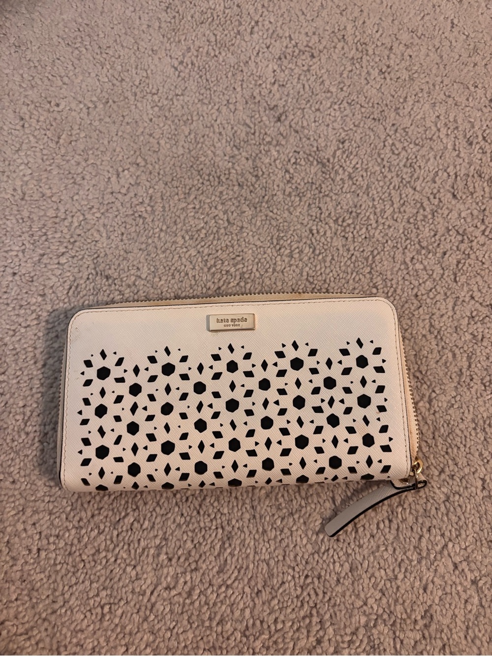 kate spade cream laser-cut floral zip-around wallet with black underlay